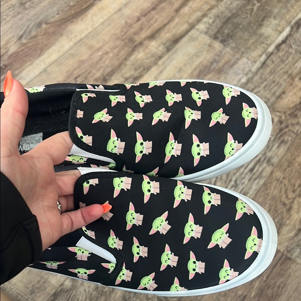 Black Slip-On Shoes with Green Character Print